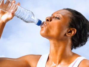 Staying hydrated is essential during hot weather workouts. (Photographer: Peter Dazeley/Getty Images)