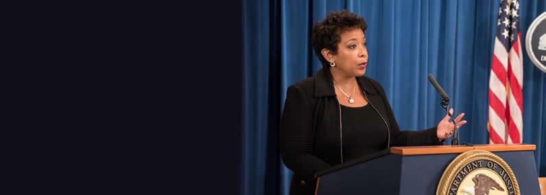 U.S. Attorney General Loretta Lynch discusses gender bias in domestic violence and sexual assault cases. Photo: U.S. Dept. of Justice.