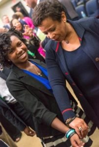 Attorney General Loretta Lynch with 14-year-old Erica Lofton, founder of in Girls in Action Inc. in Milwaukee, who distributed 2,000 bracelets to politicians, police officers, ministers and students who pledged: “I don’t commit violence; I speak out against it.” Photo: Lonnie Tague/U.S. Dept. of Justice