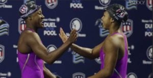 Screen shot of Olympian Lia Neal, right, celebrating with her Stanford teammate and friend, Simone Manuel, as the first two black women on the U.S. swim team.