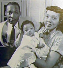 During the 1955 Montgomery Bus Boycott, Coretta Scott King was in her home with 2-year-old Yolanda, when it was firebombed. Martin Luther King was away. (Public domain photo.)