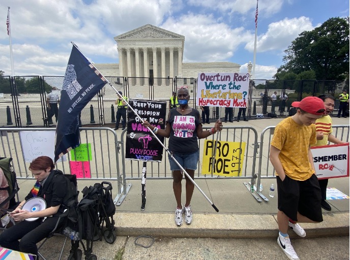 Nadine Seiler, 57, of Waldorf, Maryland, protests at Supreme Court. (Photo: Mary Solomon/VoicesofTomorrow.news)